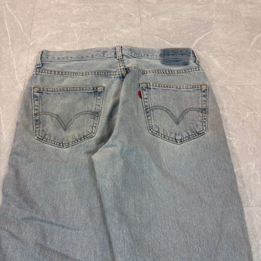 Levis 550 Relaxed Fit Jeans Mens W34 L30 Light Wash Distressed Denim 3099